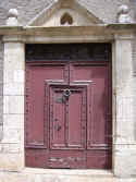 ancient red Door at Martel